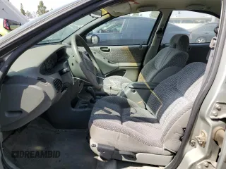 1997 Dodge Stratus z VIN 1B3EJ56H0VN679440, wystawiony jako Copart lot #71977454 z przebiegiem 83 367 mil mil oraz Tytuł czysty. Historia ofert i sprzedaży dostępna na DreamBid. Obrazek 7.