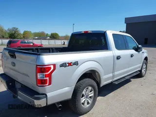 2018 Ford F-150 XL with VIN 1FTFW1EG8JKE52322, listed as a IAAI auction lot 42064789 with 159,365 mi miles. Bid and sale history available at carsss.com. Image 4.