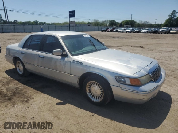1999 Mercury Grand Marquis LS z VIN 2MEFM75W5XX673218, wystawiony jako Copart lot #52621285 z przebiegiem 163 642 mil mil oraz Szkoda całkowita • Salvage title. Historia ofert i sprzedaży dostępna na DreamBid. Obrazek 4.