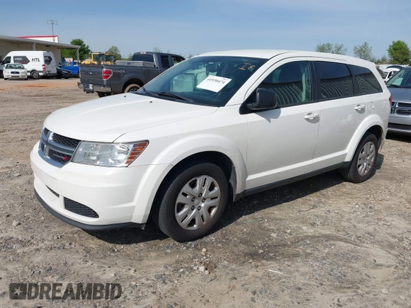 2015 Dodge Journey American Value Pkg with VIN 3C4PDCAB8FT605870, listed as a IAAI auction lot 41930474 with 205,741 mi miles. Bid and sale history available at carsss.com. Image 2.