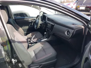 2018 Toyota Corolla L z VIN 2T1BURHEXJC098138, wystawiony jako IAAI lot #41935621 z przebiegiem 103 937 mil mil oraz . Historia ofert i sprzedaży dostępna na DreamBid. Obrazek 5.