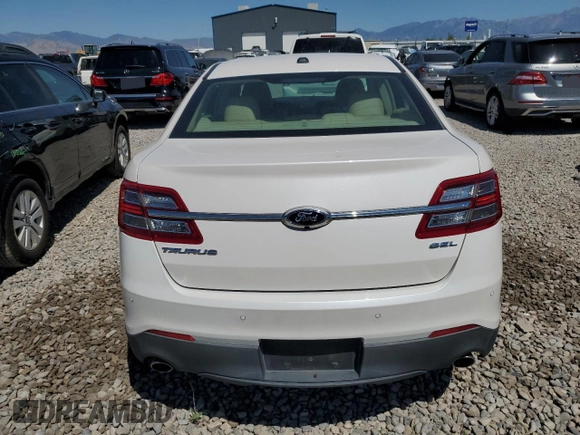 2015 Ford Taurus SEL z VIN 1FAHP2E8XFG181929, wystawiony jako Copart lot #64022325 z przebiegiem 106 272 mil mil oraz Szkoda całkowita • Salvage title. Historia ofert i sprzedaży dostępna na DreamBid. Obrazek 6.