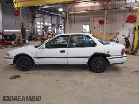 1993 Honda Accord z VIN 1HGCB7651PA022436, wystawiony jako IAAI lot #41785092 z przebiegiem Nie podano mil oraz . Historia ofert i sprzedaży dostępna na DreamBid. Obrazek 14.