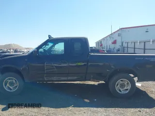 2001 Ford F-150 XL z VIN 2FTRX18L41CA04375, wystawiony jako IAAI lot #42443767 z przebiegiem 345 170 mil mil oraz . Historia ofert i sprzedaży dostępna na DreamBid. Obrazek 15.