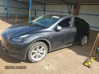 2024 Tesla Model Y z VIN 7SAYGDED1RF005050, wystawiony jako Copart lot #56755205 z przebiegiem 29 460 mil mil oraz Szkoda całkowita • Salvage title. Historia ofert i sprzedaży dostępna na DreamBid. Obrazek 1.