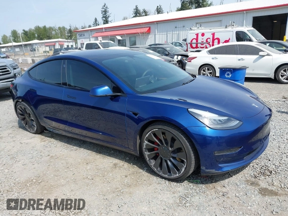 2021 Tesla Model 3 Performance with VIN 5YJ3E1EC1MF000961, listed as a IAAI auction lot 42110524 with 31,890 mi miles and . Bid and sale history available at carsss.com. Image 13.