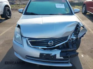 2012 Nissan Sentra S z VIN 3N1AB6AP6CL724881, wystawiony jako IAAI lot #41959859 z przebiegiem 110 858 mil mil oraz . Historia ofert i sprzedaży dostępna na DreamBid. Obrazek 13.