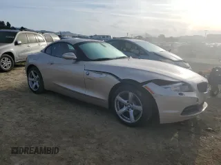 2011 BMW Z4 sDrive30i with VIN WBALM5C5XBE379369, listed as a Copart auction lot 48490475 with 99,425 mi miles and Salvage Title. Bid and sale history available at carsss.com. Image 4.