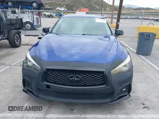 2014 Infiniti Q50 with VIN JN1BV7AP6EM689012, listed as a IAAI auction lot 42063216 with 114,785 mi miles and . Bid and sale history available at DreamBid. Image 12.