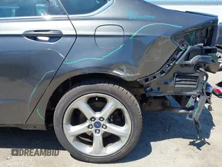 2016 Ford Fusion SE with VIN 3FA6P0T91GR263632, listed as a IAAI auction lot 42622712 with 184,000 mi miles and . Bid and sale history available at DreamBid. Image 6.