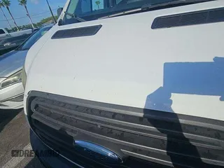 2015 Ford Transit with VIN 1FTNE2YM2FKA84765, listed as a IAAI auction lot 42241321 with 115,315 mi miles and . Bid and sale history available at DreamBid. Image 2.
