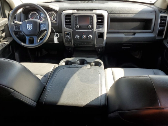 2023 Ram 1500 Tradesman with VIN 1C6RR7FTXPS588759, listed as a Copart auction lot 71082284 with 31,945 mi miles and Salvage title. Bid and sale history available at DreamBid. Image 8.