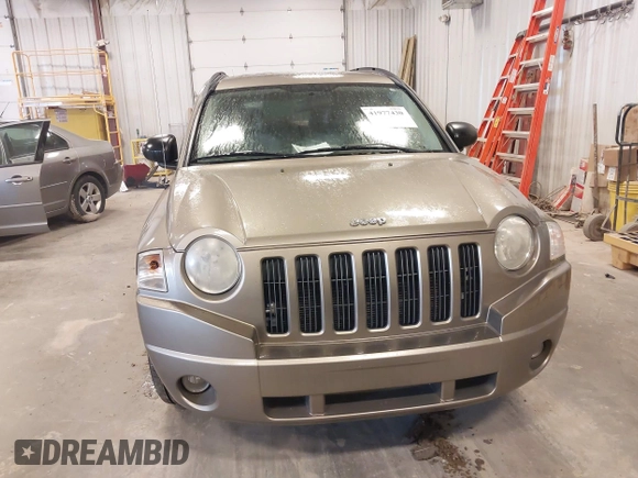 2007 Jeep Compass Sport with VIN 1J8FT47W27D221825, listed as a IAAI auction lot 41977430 with 113,445 mi miles. Bid and sale history available at carsss.com. Image 6.