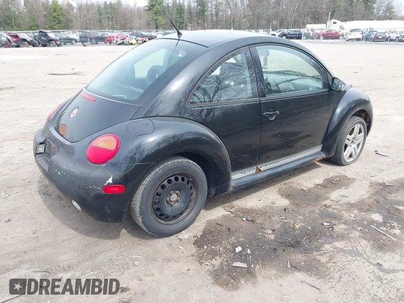 2004 Volkswagen New Beetle Coupe GL with VIN 3VWBK31CX4M416912, listed as a IAAI auction lot 42125377 with 999,999 mi miles. Bid and sale history available at carsss.com. Image 4.