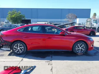 2020 Hyundai Sonata Hybrid Blue with VIN KMHL24JJ1LA009550, listed as a IAAI auction lot 41265226 with 85,347 mi miles. Bid and sale history available at carsss.com. Image 14.