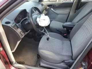 2007 Ford Focus SE with VIN 1FAFP36N87W183509, listed as a Copart auction lot 54649255 with 156,260 mi miles and Salvage title. Bid and sale history available at DreamBid. Image 7.