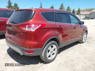 2015 Ford Escape SE z VIN 1FMCU0G79FUC75335, wystawiony jako IAAI lot #42222863 z przebiegiem 132 592 mil mil oraz . Historia ofert i sprzedaży dostępna na DreamBid. Obrazek 4.