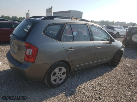 2009 Kia Rondo LX Base with VIN KNAFG528697282779, listed as a Copart auction lot 58926614 with 115,355 mi miles and Salvage Title. Bid and sale history available at carsss.com. Image 3.