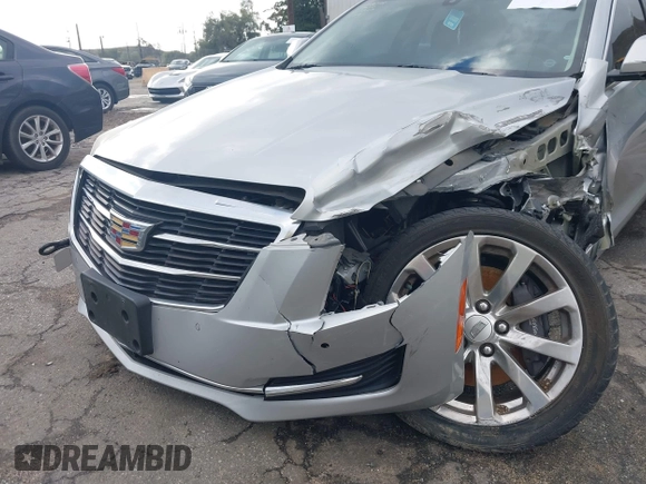 2018 Cadillac ATS Luxury RWD z VIN 1G6AB5RX6J0110860, wystawiony jako IAAI lot #41556662 z przebiegiem 63 886 mil mil oraz . Historia ofert i sprzedaży dostępna na DreamBid. Obrazek 18.