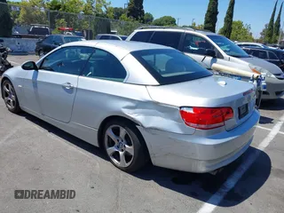 2007 BMW 3 Series 328i with VIN WBAWR33557PX78785, listed as a IAAI auction lot 42715324 with 141,544 mi miles and . Bid and sale history available at DreamBid. Image 3.
