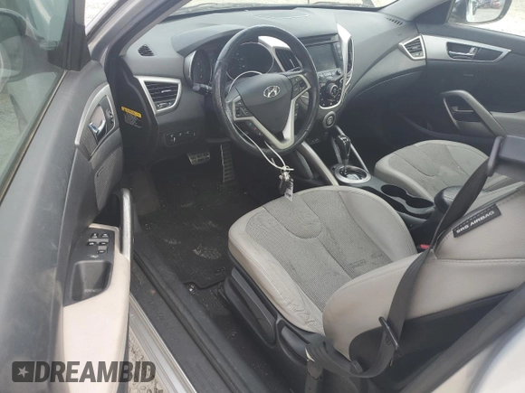 2012 Hyundai Veloster w/Black Int с VIN KMHTC6AD2CU063070, выставлен на аукционе Copart как лот 60391315 с пробегом 153 745 миль миль и Списание • Salvage title. История ставок и продаж доступна на DreamBid. Изображение 8.