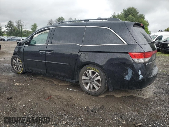 2014 Honda Odyssey Touring with VIN 5FNRL5H95EB056118, listed as a Copart auction lot 57729865 with Not provided miles and Salvage title. Bid and sale history available at DreamBid. Image 2.