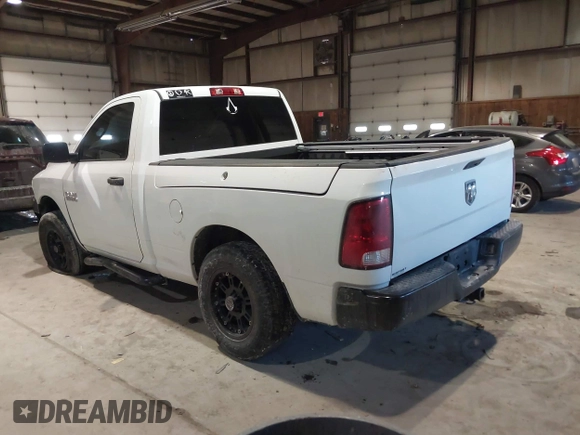 2014 Ram 1500 Express with VIN 3C6JR6AG7EG310097, listed as a IAAI auction lot 41409343 with 134,140 mi miles and . Bid and sale history available at DreamBid. Image 3.