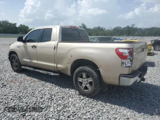 2010 Toyota Tundra с VIN 5TFRY5F14AX093529, выставлен на аукционе Copart как лот 60121455 с пробегом 174 997 миль миль и Списание • Salvage title. История ставок и продаж доступна на DreamBid. Изображение 2.