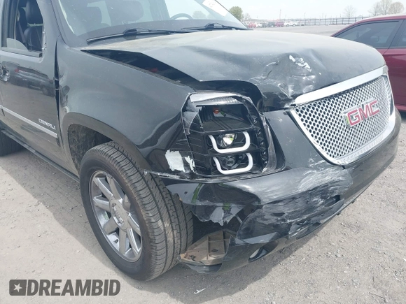 2014 GMC Yukon Denali z VIN 1GKS1EEFXER113493, wystawiony jako IAAI lot #41742662 z przebiegiem 150 382 mil mil oraz . Historia ofert i sprzedaży dostępna na DreamBid. Obrazek 6.