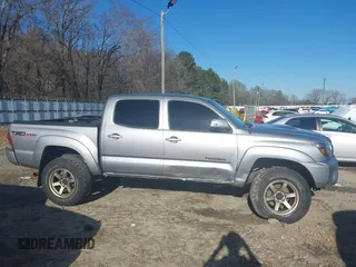 2014 Toyota Tacoma with VIN 3TMLU4ENXEM147587, listed as a IAAI auction lot 41493027 with 160,207 mi miles. Bid and sale history available at carsss.com. Image 14.