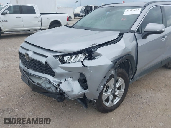 2020 Toyota RAV4 XLE with VIN 2T3W1RFV4LW094687, listed as a IAAI auction lot 42652039 with 56,693 mi miles and . Bid and sale history available at DreamBid. Image 6.