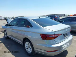 2019 Volkswagen Jetta S with VIN 3VWC57BU0KM208044, listed as a IAAI auction lot 42373582 with 87,008 mi miles and . Bid and sale history available at DreamBid. Image 3.