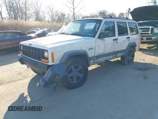 1997 Jeep Cherokee Sport with VIN 1J4FJ68S3VL551278, listed as a IAAI auction lot 41660577 with 282,264 mi miles. Bid and sale history available at carsss.com. Image 2.