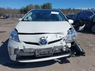 2015 Toyota Prius Four z VIN JTDKN3DU9F1875847, wystawiony jako IAAI lot #41937117 z przebiegiem 150 735 mil mil oraz . Historia ofert i sprzedaży dostępna na DreamBid. Obrazek 13.