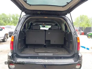 2005 GMC Envoy XL SLE with VIN 1GKET16S156114805, listed as a IAAI auction lot 42163519 with 168,584 mi miles. Bid and sale history available at carsss.com. Image 12.