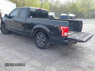 2015 Ford F-150 XL with VIN 1FTEX1CF2FKD12874, listed as a IAAI auction lot 41860610 with 242,215 mi miles. Bid and sale history available at carsss.com. Image 3.