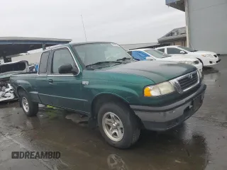 1999 Mazda B-Series 2WD Truck SE with VIN 4F4YR16V4XTM02282, listed as a Copart auction lot 85363034 with 102,923 mi miles and Clean Title. Bid and sale history available at carsss.com. Image 4.