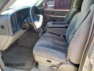 2004 Chevrolet Tahoe LS with VIN 1GNEC13Z24R310768, listed as a Copart auction lot 55886055 with 246,093 mi miles and Salvage title. Bid and sale history available at DreamBid. Image 7.