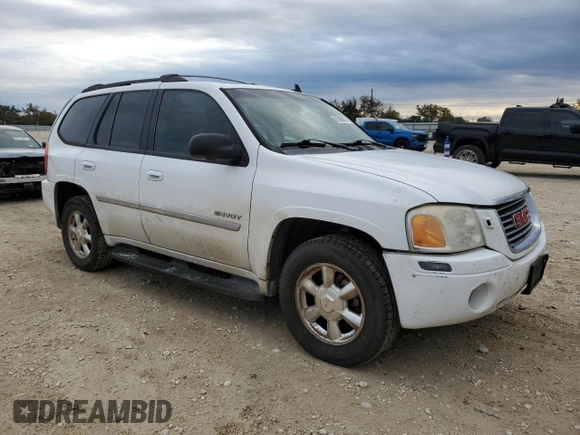 2006 GMC Envoy SLT with VIN 1GKDS13S362197312, listed as a Copart auction lot 83999074 with 217,220 mi miles and Clean Title. Bid and sale history available at carsss.com. Image 4.