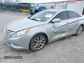 2013 Hyundai Sonata Limited with VIN 5NPEC4AB9DH564386, listed as a IAAI auction lot 42006572 with 212,911 mi miles and . Bid and sale history available at carsss.com. Image 2.