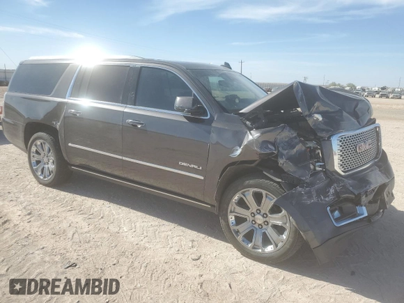 2015 GMC Yukon XL Denali with VIN 1GKS2JKJ3FR743050, listed as a Copart auction lot 50174675 with 143,154 mi miles and Salvage Title. Bid and sale history available at carsss.com. Image 4.