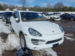 2014 Porsche Cayenne with VIN WP1AA2A2XELA95734, listed as a IAAI auction lot 41583908 with 95,751 mi miles and . Bid and sale history available at DreamBid. Image 1.