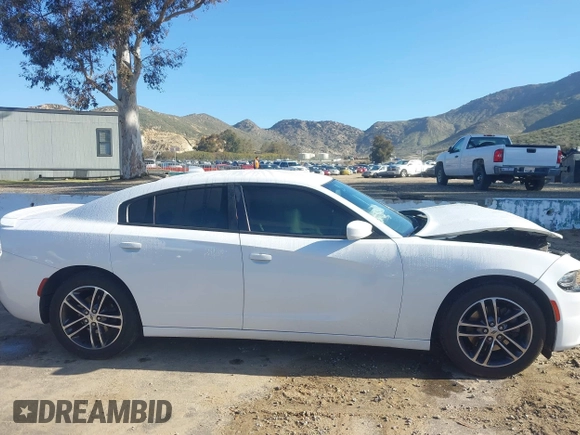 2019 Dodge Charger SXT with VIN 2C3CDXJGXKH533322, listed as a IAAI auction lot 41808838 with 95,877 mi miles and . Bid and sale history available at DreamBid. Image 14.