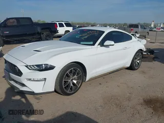 2021 Ford Mustang EcoBoost z VIN 1FA6P8TD5M5133239, wystawiony jako IAAI lot #41899042 z przebiegiem 65 553 mil mil oraz . Historia ofert i sprzedaży dostępna na DreamBid. Obrazek 17.