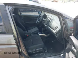 2015 Honda Fit LX with VIN 3HGGK5H5XFM744332, listed as a IAAI auction lot 42149999 with 91,101 mi miles. Bid and sale history available at carsss.com. Image 5.