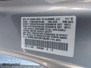 2016 Honda Odyssey Touring Elite with VIN 5FNRL5H91GB158499, listed as a IAAI auction lot 41899037 with 119,364 mi miles. Bid and sale history available at carsss.com. Image 9.