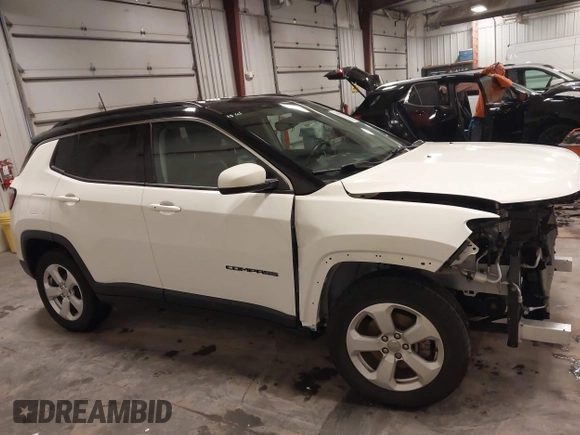 2019 Jeep Compass Latitude with VIN 3C4NJDBB0KT834607, listed as a IAAI auction lot 41932794 with 74,694 mi miles. Bid and sale history available at carsss.com. Image 14.