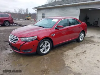 2014 Ford Taurus SEL with VIN 1FAHP2E87EG121203, listed as a IAAI auction lot 41908069 with 140,451 mi miles. Bid and sale history available at carsss.com. Image 2.
