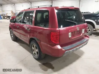 2004 Honda Pilot EX with VIN 2HKYF18584H588973, listed as a IAAI auction lot 41800129 with 221,498 mi miles. Bid and sale history available at carsss.com. Image 3.
