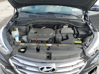 2017 Hyundai Santa Fe 2.4L z VIN 5XYZUDLB1HG412675, wystawiony jako Copart lot #57169045 z przebiegiem 38 947 mil mil oraz Szkoda całkowita • Salvage title. Historia ofert i sprzedaży dostępna na DreamBid. Obrazek 12.